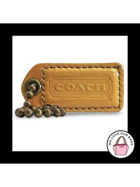 COACH 65TH ANNIVERSARY HangTag 2" Yellow & White Leather Bag Charm Antique Brass